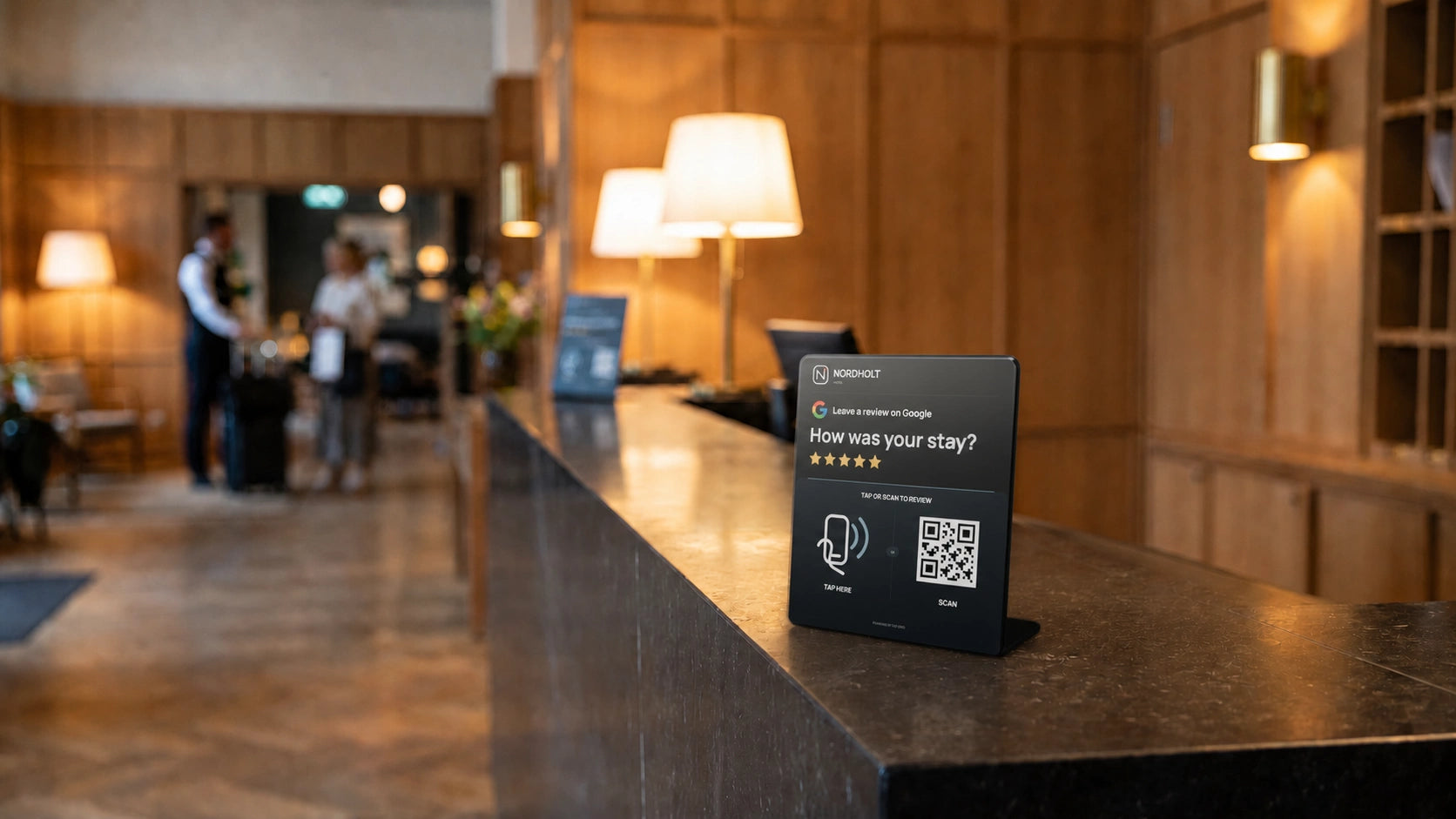 Fictional Nordholt Hotel Custom Tapvero Stand visualized on a hotel reception counter
